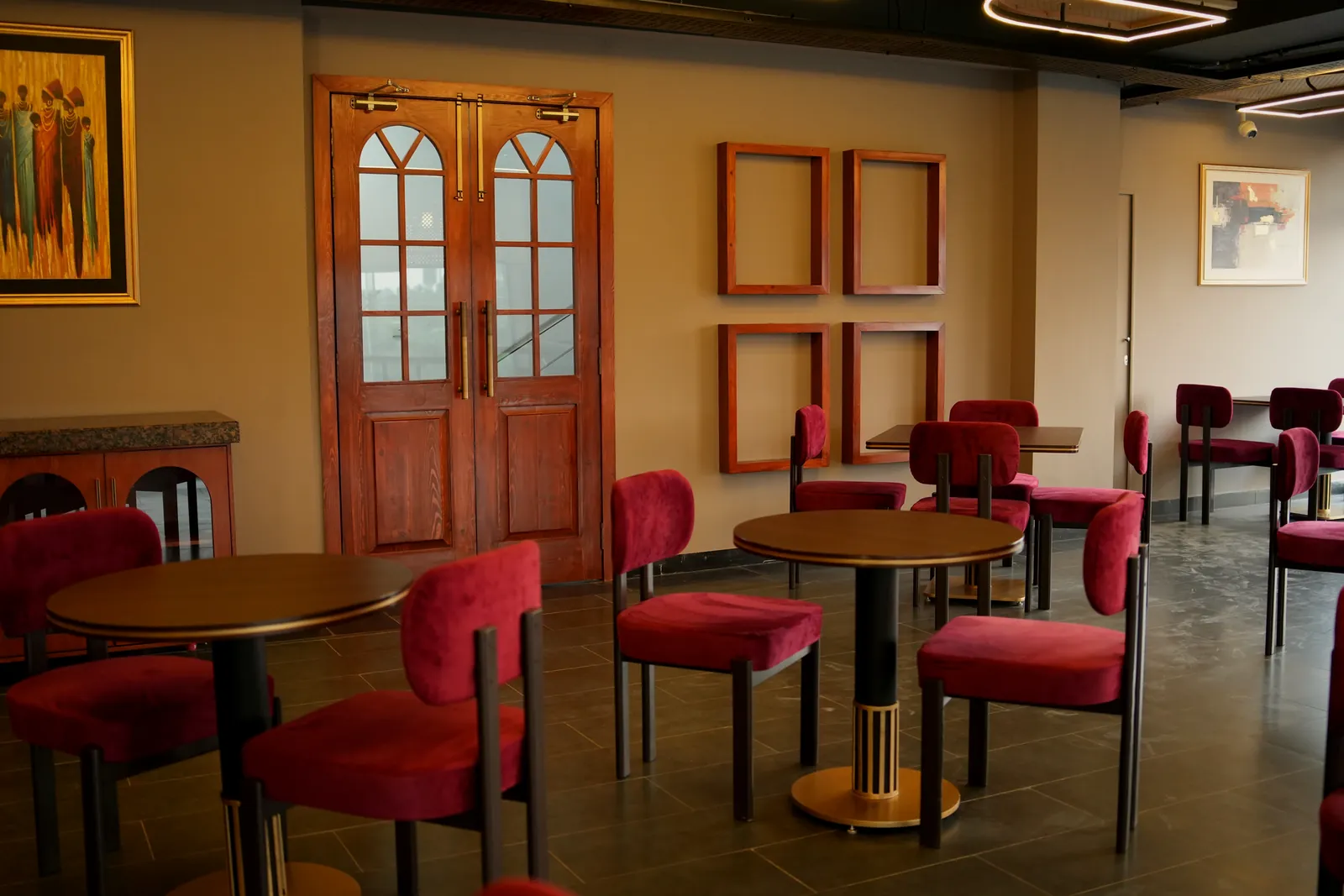 Wooden doors and gallery frames upstairs